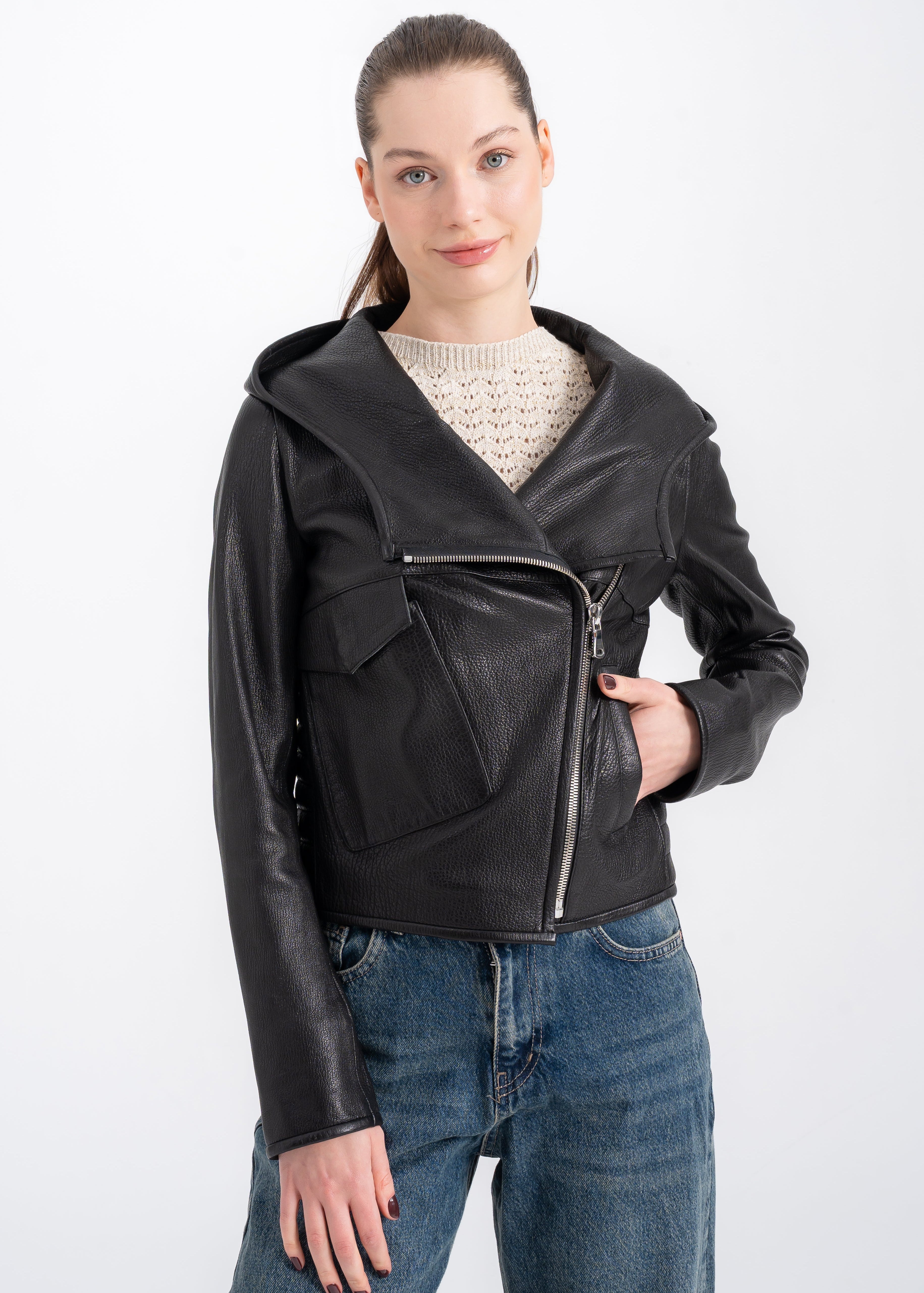 Model wearing a black lambskin leather jacket with hood and asymmetric zipper, featuring textured surface and modern fitted silhouette,  by Lebeni.