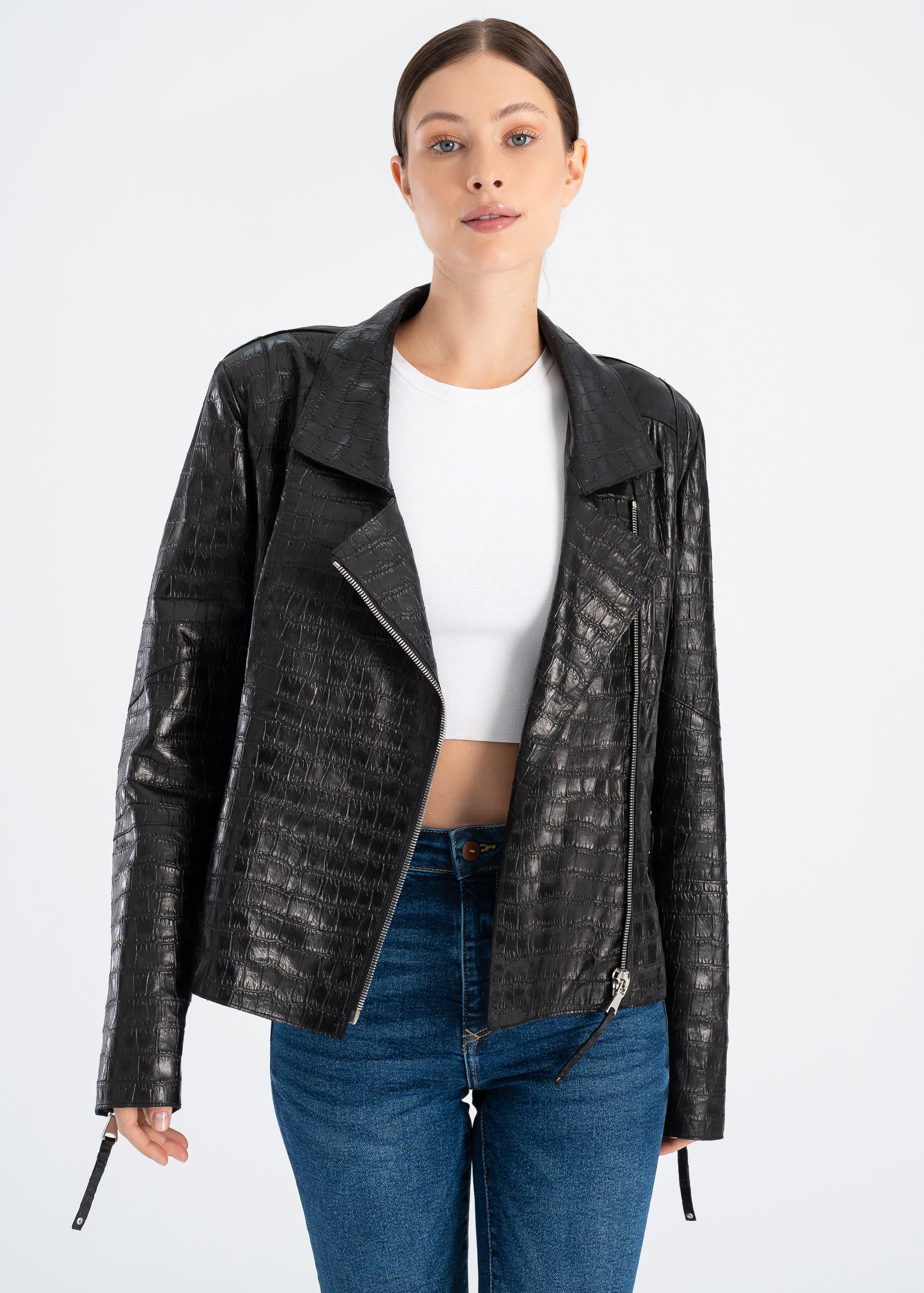 Woman wearing a fitted black croco embossed lambskin leather jacket with stand collar, front gold tone zipper, discreet side zip pockets and smooth satin lining by Lebeni.